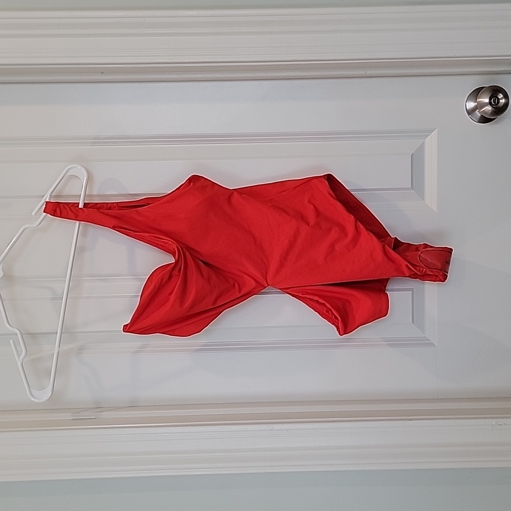 Aqua swim one piece, shark bite. Red. NWT. Large
